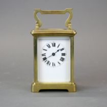 A brass carriage clock, H. 14.5cm, understood to be in working order.