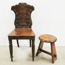 A 19th C carved mahogany hall chair together with a small oak stool, chair H. 85cm.