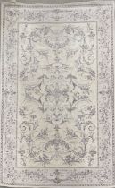 A cream and lavender ground contemporary aubusson style rug, 195 x 137cm.