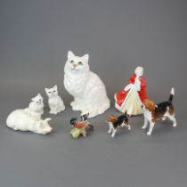 A Royal Doulton figurine, with a group of Beswick animals and bird.