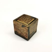 A Chinese bronze scholars seal, 3.5 x 3.5 x 3.5cm.