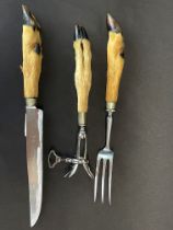 Taxidermy interest: Roe deer hoof handled meat carving cutlery set comprising a carving knife,