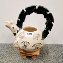 A signed studio pottery water jug by Marilyn Andrews, H. 29cm.