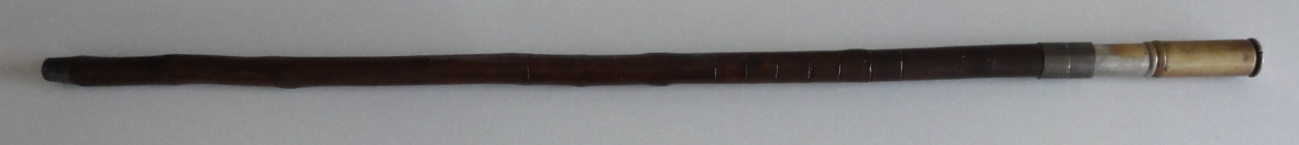 Otis King’s Calculator Stick An unusually heavy stick which was originally used as a measure.