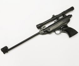 An Italian air pistol with telescopic sight, L. 54 cm.