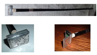 This cane has an ebonized shaft and a silver vesta box as a handle The box, which is fully hall