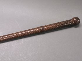 An early 20th century Indian army officer's walking/swagger stick covered with plaited leather, L.