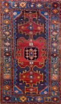 A hand woven eastern wool rug, 192 x 126cm.