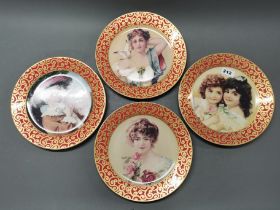 Four continental decorative cabinet plates, Dia. 27cm.