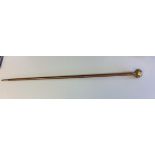 This most unusual cane has an aid to powder inside ladies’ gloves. The brass handle screws off