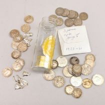 A quantity of English silver coins.