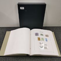 A cased Stanley Gibbons hingeless stamp album 1961-1974 including all phosphore issues and all