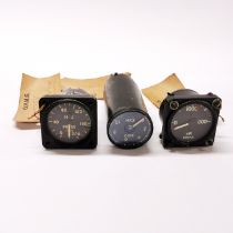 A group of three aircraft instruments from a Wessex helicopter, B29 flying fortress and a