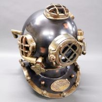 A decorative copper and brass reproduction US Navy diving helmet, H. 44cm.