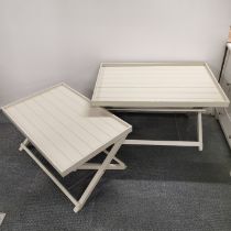 Two handmade cream finished folding occasional tables, largest 98 x 67 x 50cm. One possibly ill
