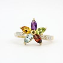 A 9ct yellow gold ring set with peridot, amethyst, blue topaz, garnet and citrine, (L.5).