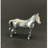 A 925 silver model of a horse, H. 4cm.