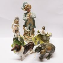 Two Royal Doulton figurines, together with a Royal Dux elephant, a dog figure and two 19th century