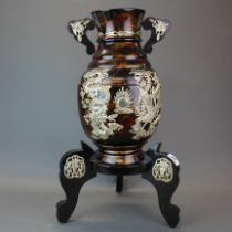 A large Oriental silvered metal and lacquer vase on stand, H. 56cm.