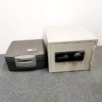 A Sentry combination safe together with a Sentry Fire-safe waterproof lockbox, safe 42 x 42 x 35cm.