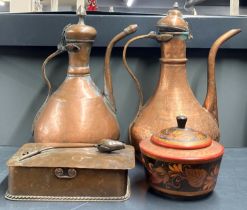 An Arts and Crafts hammered copper box with two Eastern hammered copper coffee pots. With a group of