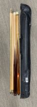 Two Cliff Thorburn BCE Two Piece Snooker Cues, one with mother of Pearl inlay. Storage bag