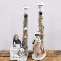 Two Nao figural table lamps, H. 39cm.