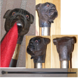 An interesting automated gadget stick. The handle is carved in the form of a dog’s head. The eyes,