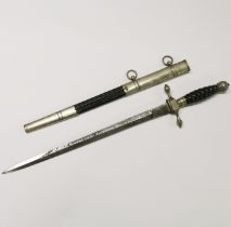 A 19th century German fireman's presentation dagger with detailed engraving to blade for 1898, L.