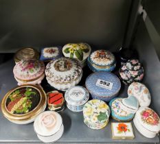 A collection of porcelain and other small boxes.