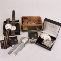 A group of watches and coins.