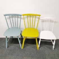 A pair of Danish Farstrup yellow and teal finished spindle back kitchen chairs together with a