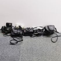 A Canon FTB single lens reflex camera etc.
