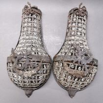 A pair of cast metal and glass wall lights, H. 43cm.