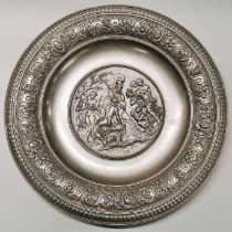 A 19th century cast iron figurative dish/wall panel, Dia. 44cm.