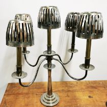 A large silver plated sprung-candle candelabrum, H. 62cm.