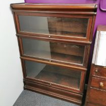A Globe Wernicke three section stacking bookcase, 120 x 86 x 32cm.