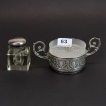 An Art Nouveau .800 silver holder with frosted glass liner, W. 16cm and a silver plate and crystal