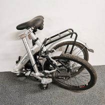 A folding/collapsible Apollo Transition bicycle with custom tubing and Shimano gears and breaks,