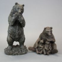 A detailed cast bronze figure of a bear, H. 28cm, together with a further bronze bear.