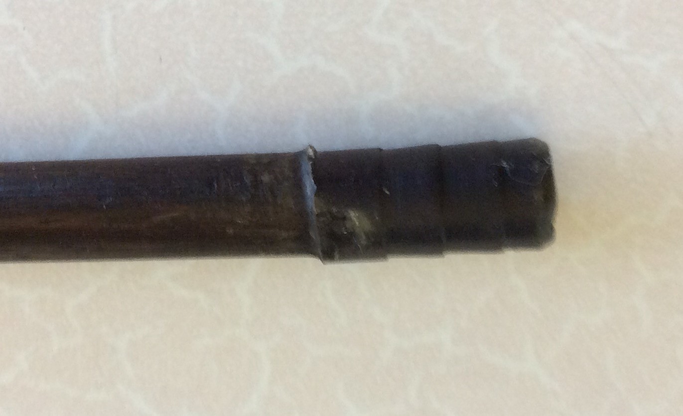 A simple rosewood stick with a brass section set just below the handle. Two small bolts hold the - Image 8 of 8