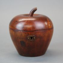 A turned wooden apple tea caddy, Dia. 11cm, H. 11cm.