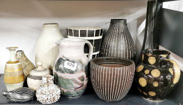 A quantity of interesting pottery items.