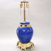 A 19th/early 20th century ormulu mounted (probably Chinese) porcelain table lamp, H. 64cm.