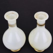 A pair of original Qing Dynasty (1644 to 1912) Chinese glass vases imitating white jade, H. 20.5cm.