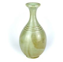 A Chinese ribbed porcelain vase, H. 20.5cm.