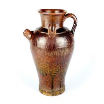 A Chinese brown pottery water dropper. H.28cm.