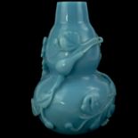 A blue Peking glass gourd vase with relief decoration, H. 17cm.