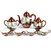 A Japanese hand painted and gilt three-piece tea set with four matching cups without saucers.