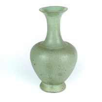 A Chinese celadon crackle glazed pottery vase. H. 20cm.